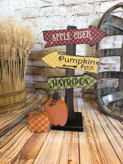 Unfinished kit measures apx. 10” tall and includes wooden MDF 
•sign 
•base 
•2- pumpkins 
•vinyl 
