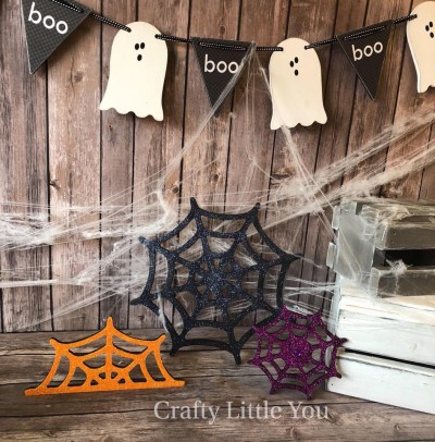 Unfinished kit measures apx. 10” tall and includes wooden MDF 
•large, medium, small spider web

