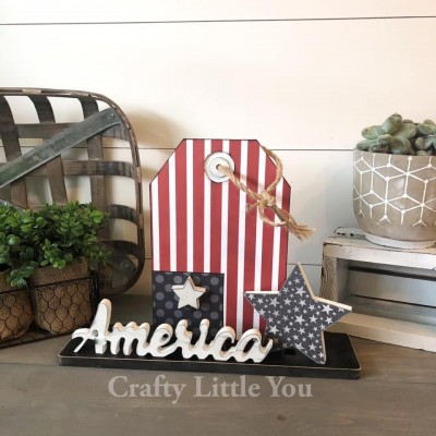 Unfinished kit measures apx. 10”
tall and comes with wooden MDF 
•AMERICA word cut out 
•2 stars 
•tag 
