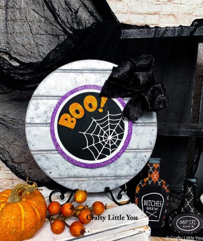 Unfinished kit measures 6.75”
And includes wooden MDF
•circle with grooves
•white vinyl with “Boo” stencil
•1 Velcro
