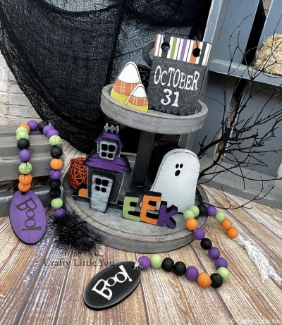 Unfinished kit measures 5” tall on the sign, and includes wooden MDF”
•2 CANDY CORN
•CALENDAR with white vinyl
•haunted house, door and window
•EEK word
•GHOST
