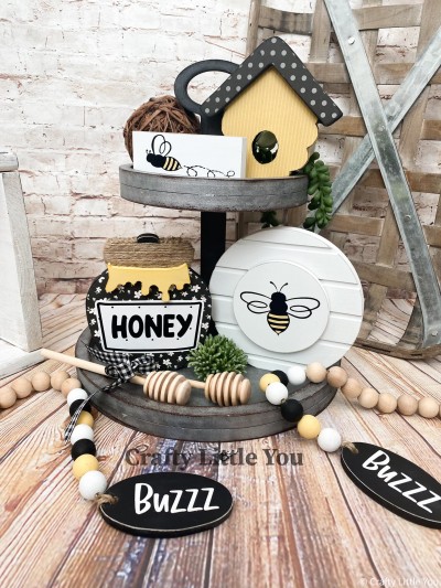 Unfinished kit measures 5.5” tall on the window and includes wooden MDF”
•beehive and roof
•little sign and flying bee vinyl
•honey pot, honey overlay and vinyl
•shiplap circle, circle overlay and bee vinyl
