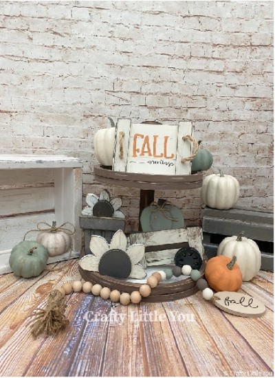 Unfinished kit measures 6" tall on wagon and includes:
* Wagon & pumpkin with wheel overlay
* Fall Greetings tray with  (2) end piece overlays
* Sunflower and center overlay
* Sunflower in pot with center overlay and pot lip overlay
* Black Vinyl (Fall is stencil)