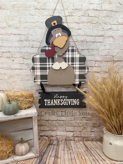 Unfinished kit measures apx. 18" on hanging height, and 13.25" on turkey.  Includes wooden MDF: 
*Feather & hat back piece
* Beak overlay
* Hat brim overlay 
* Collar
* Sign 
* White vinyl
- Eyes
- Eyebrows (stencil) 
- "Happy Thanksgiving" (reverse stencil) 