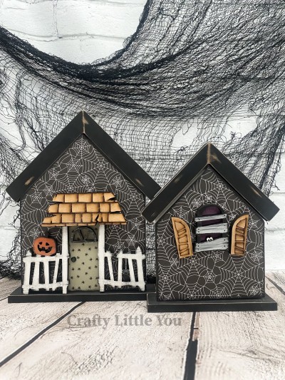 Unfinished kit measures apx. 8"x6.25" and includes wooden MDF:
* 2 house overlays
* 2 porch railings (each with either a pumpkin or hanging spider attached)
* 1 front porch awning
* 1 front door window 
* 2 shutters
* 1 slatted window

-- Interchangeable Stacking Houses main piece sold separately. --