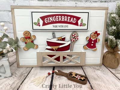 Unfinished kit measures apx. 11"x3.5" on sign and includes: 
* Main title plaque
* 2 gingerbread cookies
* 1 set of mixing bowls with rim overlays
* 3 peppermints
* Black vinyl
* 4 pieces Velcro