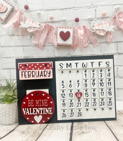 Unfinished kit measures apx. 6" on the circle and includes wooden MDF: 
* 1 hanging circle
* "VALENTINE" wood overlay letters
* 1 hanging heart date tag
* White vinyl (some is stencil) 