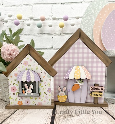 Unfinished kit measures apx. 8"x6.25" and includes wooden MDF: 
* 2 house overlays
* 1 window and awning with bunny and carrot attached
* 1 front door awning
* 1 front door
* 1 carrot wreath overlay
* 1 bunny peeking from egg
* 1 street sign with engraved street names
* 2 pieces Velcro