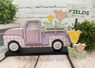 Unfinished kit measures apx. 3" tall 
Kit includes 4 wooden tulips,sign, vinyl, and dowel
*truck sold separately