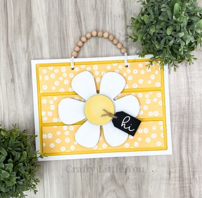 Unfinished kit measures apx. 8.5"x12" and includes wooden MDF:
* 1 rectangle plaque with grooves
* 1 daisy overlay 
* 1 circle center of flower overlay
* 1 tag
* White vinyl