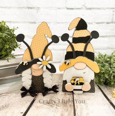 Unfinished kit includes wooden MDF: 
* 2 Hats
* 2 Brims
* 4 Bee Antennae
* 1 Pot of Honey
* 1 Dress
* 3 Bee Overlays
* 10 dot Velcros
* 1 Flower with oval center overlay
