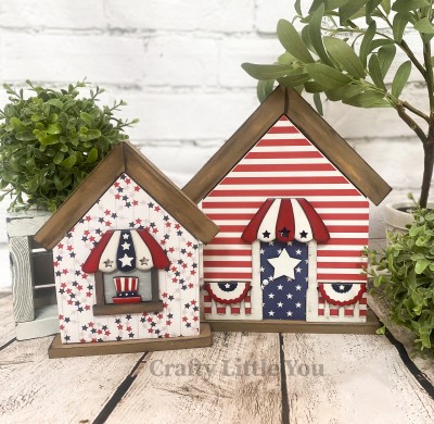 Unfinished kit measures apx. 8"x6.25" and includes wooden MDF:
* 2 house overlays
* 1 window awning with attached windowsill and hat
* 1 front porch awning
* 2 front porch posts and railings
* 2 bunting pennants
* 1 door hanger star
* White vinyl stars
* 2 pieces Velcro