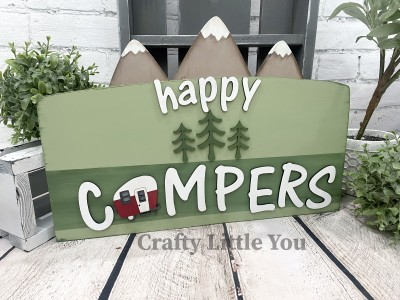 Unfinished kit measures apx. 17.5"x12" and includes wooden MDF:
* 1 sign main piece
* 1 set of 3 connected mountains
* 1 set of "happy campers" wood overlay letters
* 1 camper overlay
* 3 tree overlays