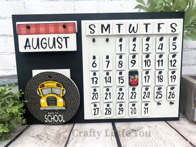 Unfinished kit measures apx. 5" and includes wooden MDF:
* 1 hanging circle
* 1 bus main piece
* 1 hood piece overlay
* 1 calendar date hanging tag
* 1 miniature apple and worm overlay
* White vinyl