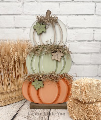 Unfinished kit measures apx. 9"x16" tall and includes wooden MDF:
*1 set of 3 connected pumpkins with grooves and peg on bottom
*3 leaf overlays
*1 base with peg hole
