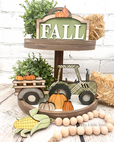 Unfinished kit measures apx. 5" on the tractor and includes wooden MDF:
*1 sign main back piece
*1 overlay frame for sign
*2 miniature overlay pumpkins for sign
*1 set of "FALL" wood overlay letters
*1 trailer main piece
*1 connected fence, wheel well, and tire overlay for trailer
*1 tractor
*2 tractor tire overlays
 *3 sitting pumpkins