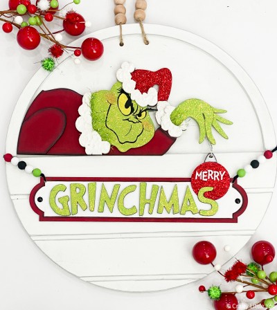 Unfinished kit measures apx. 13"x6" and includes wooden MDF:
*1 Grinch main piece
*1 arm overlay
*1 neck fur overlay
*1 hat fur overlay
*1 sleeve fur overlay
*1 ornament
*1 sign
*1 set of “Grinchmas” letters
*White and Black vinyl