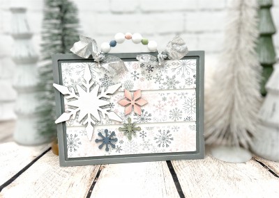 Unfinished kit measures apx. 8.5"x12" and includes wooden MDF:
*1 rectangle board with grooves
*4 snowflake overlays