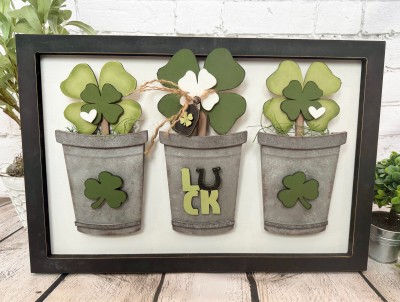 Unfinished kit measures apx. 6" tall on the largest shamrock and includes wooden MDF:
*3 large shamrocks with stems
*3 middle shamrock overlays
*2 heart overlays
*1 tag
*1 miniature shamrock for tag
*2 shamrocks for front of buckets
*1 set of connected “LUCK” letters
*3 Velcro dots