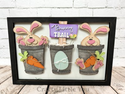 Unfinished kit measures apx. 6" tall on the sign and includes wooden MDF:
*2 bunnies
*4 ear overlays
*2 mouths
*2 noses
*4 feet
*12 toe pads
*4 foot pads
*1 Sign
*1 set of “Bunny Trail” wood letters
*1 set of miniature Easter eggs and grass
*2 carrots
*1 egg
*Vinyl
*3 Velcro dots