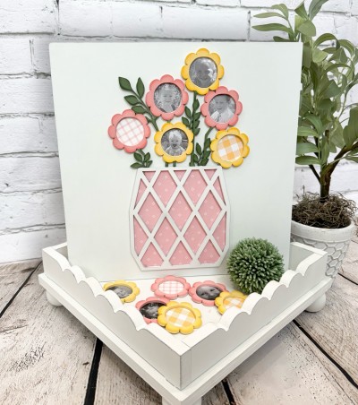Unfinished kit measures apx. 12"x12" and includes wooden MDF:
*1 sign main piece
*1 diamond flower pot
*1 set of connected flowers with cut-out centers and leaves
*6 flower overlays