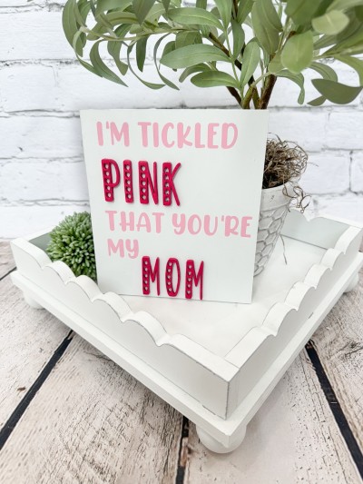Unfinished kit measures apx. 6"x7" and includes wooden MDF:
*1 sign main piece
*1 set of “PINK” and “MOM” wood overlay letters
*White vinyl

*Each kit will include both “We’re” and “I’m” in white vinyl - allowing you to select the one that suits your family best!
