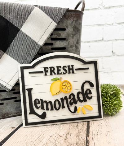 Unfinished kit measures apx. 6" x 6.5" tall and includes wooden MDF:
*1 sign piece
*1 set of “Fresh” and “Lemonade” wood letters
*1 lemon with rind, lemon wedge,and juice overlays