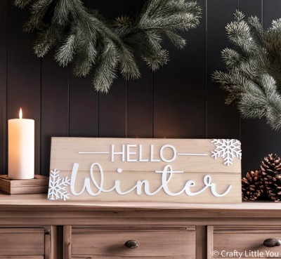 Unfinished kit measures apx. 6"x18" and includes wooden MDF: *1 main piece board engraved with wood pattern *2 snowflakes * "Hello Winter" wood letters