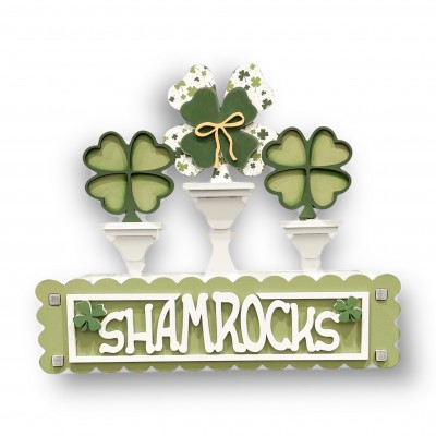 Unfinished kit measures 13.5"x5" and includes wooden MDF: *1 scalloped back *1 set of "Shamrocks" with boarder lasered wood piece *2 shamrock overlays