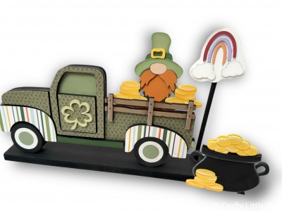 Unfinished kit measures apx. 8" on rainbow and includes wooden MDF: *1 rainbow with overlays and dowel *1 pot of gold with brim and gold overlay *1 leprechaun with beard, nose, hat brim, buckle overlay *3 piles of gold *1 shamrock