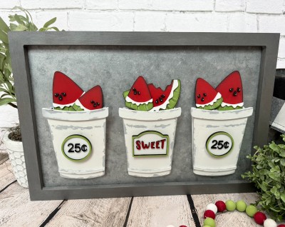 Unfinished kit includes wooden MDF:
*6 watermelon of various sizes
*6 rind overlays
*18 seeds
*2 “25¢” signs with frame overlays and wood numbers
*1 “Sweet” sign with frame overlay and wood letters
*3 Velcro dots