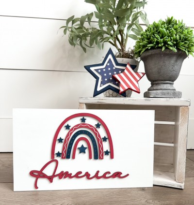 Unfinished kit measures apx.7.5"x13" and includes wooden MDF:
*(1) 7.5"x13" main back piece
*4 rainbow arcs
*8 stars
*1 “America” wood word overlay