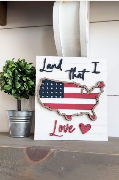 Unfinished kit measures apx. 7" x 6" tall and includes wooden MDF:
*1 sign piece
*1 America silhouette base piece
*1 America silhouette frame
*1 square with star cut-outs
*Stripes
*1 set of “Land that I Love” wood overlay words
*1 heart