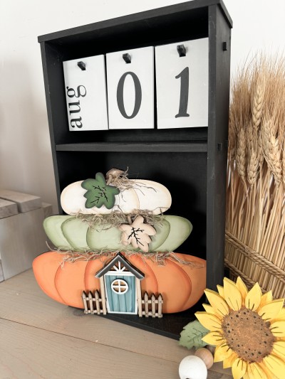 Unfinished kit measures apx. 9" tall and includes wooden MDF:
*1 stacked pumpkin main piece
*2 leaf overlays
*1 door
*1 door window overlay
*1 door awning with attaching fence