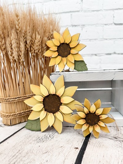 Unfinished kit measures apx. 5" on the largest sunflower and includes wooden MDF:
*1 large sunflower with petal overlays
*1 medium sunflower with petal overlays
*1 small sunflower with petal overlays