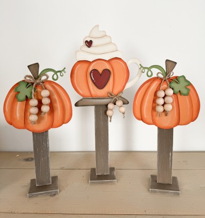 Unfinished kit measures apx. 11.25" on tallest stand and includes wooden MDF:
*2 pumpkins
*6 pumpkin center overlays
*2 pumpkin leaves
*1 pumpkin mug
*1 whipped cream overlay
*2 heart overlays
*3 stands
*3 bases