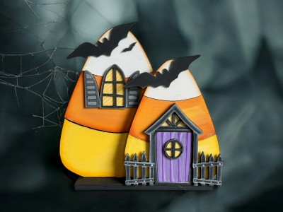 Unfinished kit measures apx. 7" tall and includes wooden MDF:
*2 candy corn main pieces
*3 bat overlays
*1 door
*1 door window overlay
*1 door awning with attaching fence
*1 window with attached shutters