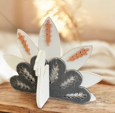 Unfinished kit measures apx. 7" tall and includes wooden MDF:
*1 turkey face and body
*1 set of pointed feathers
*1 set of rounded feathers
*3 feather decoration overlays
