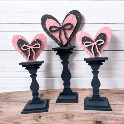 Unfinished kit is made to fit Three Pedestals and includes wooden MDF: *3 hearts (1 Large, 2 Small)
*3 heart overlays  (1 Large, 2 Small) *3 bow overlays  (1 Large, 2 Small)